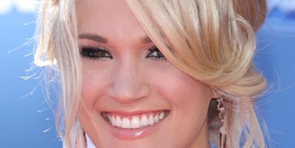 Carrie Underwood putting babies on the back burner
